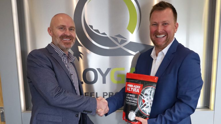 Darren Bowden of Rimblades and Curt Rathbone of AlloyGator shaking hands, symbolising the merger.